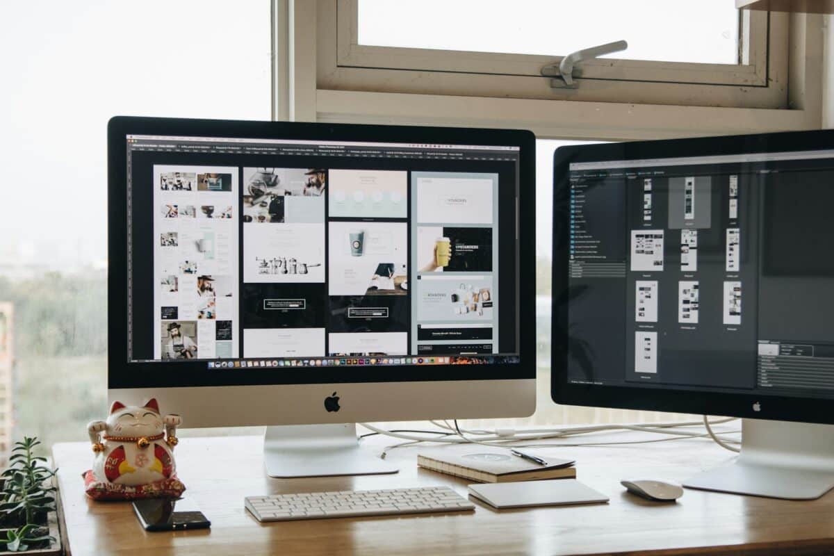Web design workspace with dual monitors