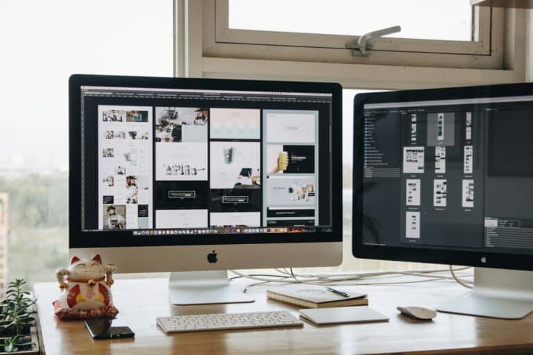 Web design workspace with dual monitors